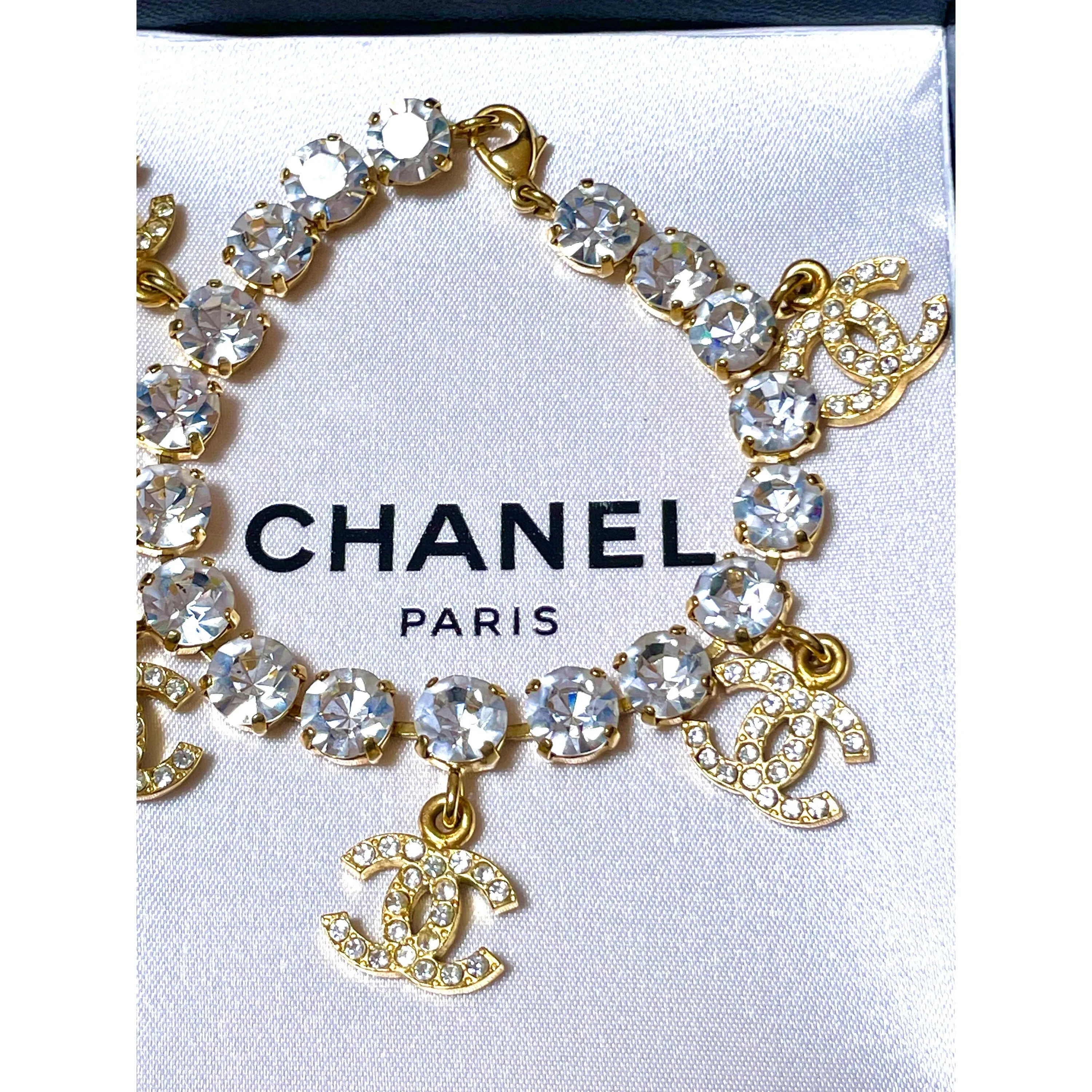 Vintage Chanel bracelet with crystal and CC charms. Must have gorgeous jewelry piece. 0407131