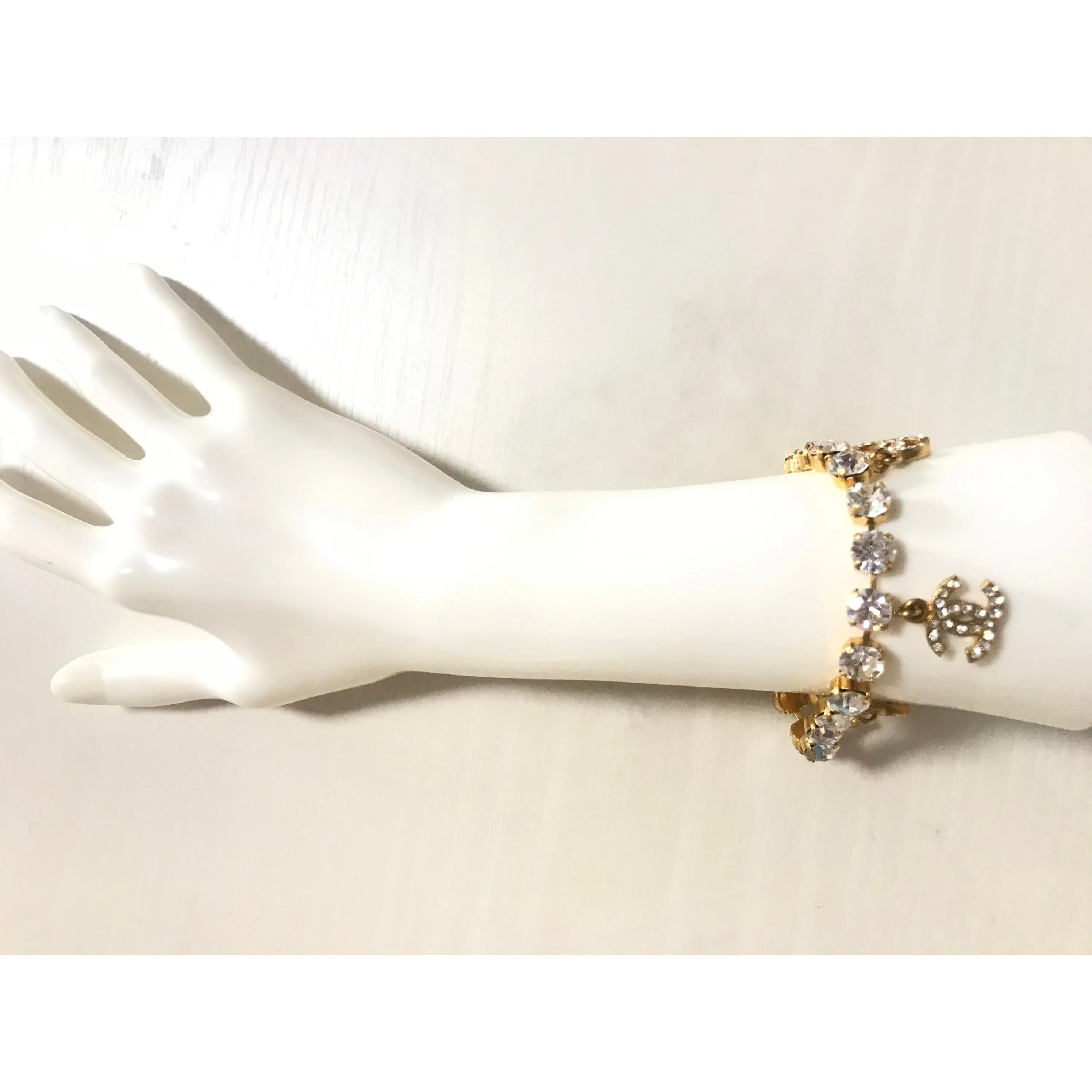 Vintage Chanel bracelet with crystal and CC charms. Must have gorgeous jewelry piece. 0407131