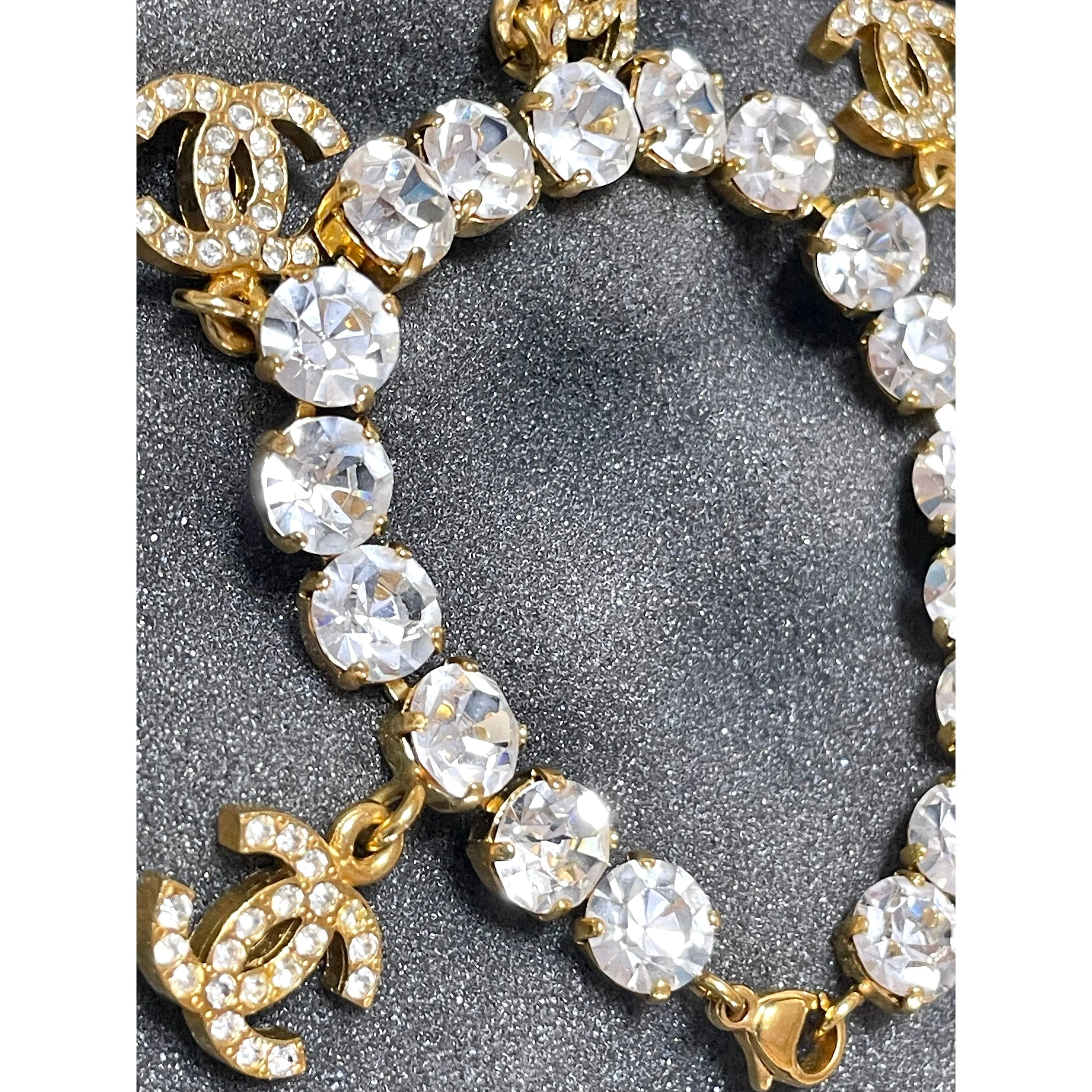 Vintage Chanel bracelet with crystal and CC charms. Must have gorgeous jewelry piece. 0407131