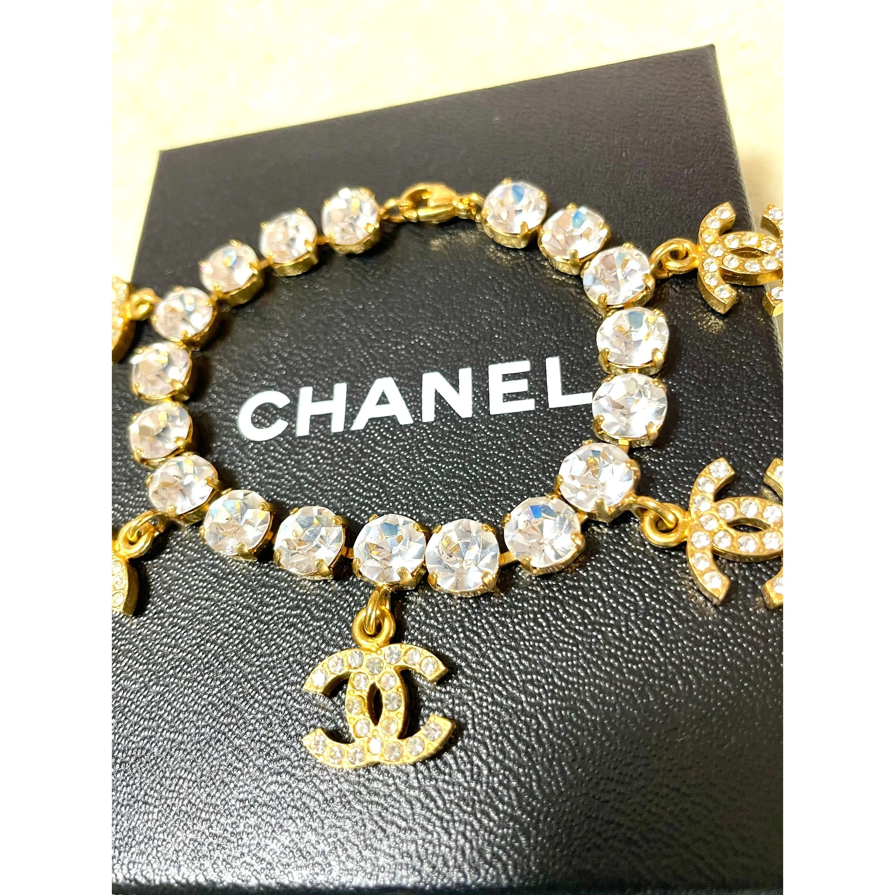 Vintage Chanel bracelet with crystal and CC charms. Must have gorgeous jewelry piece. 0407131