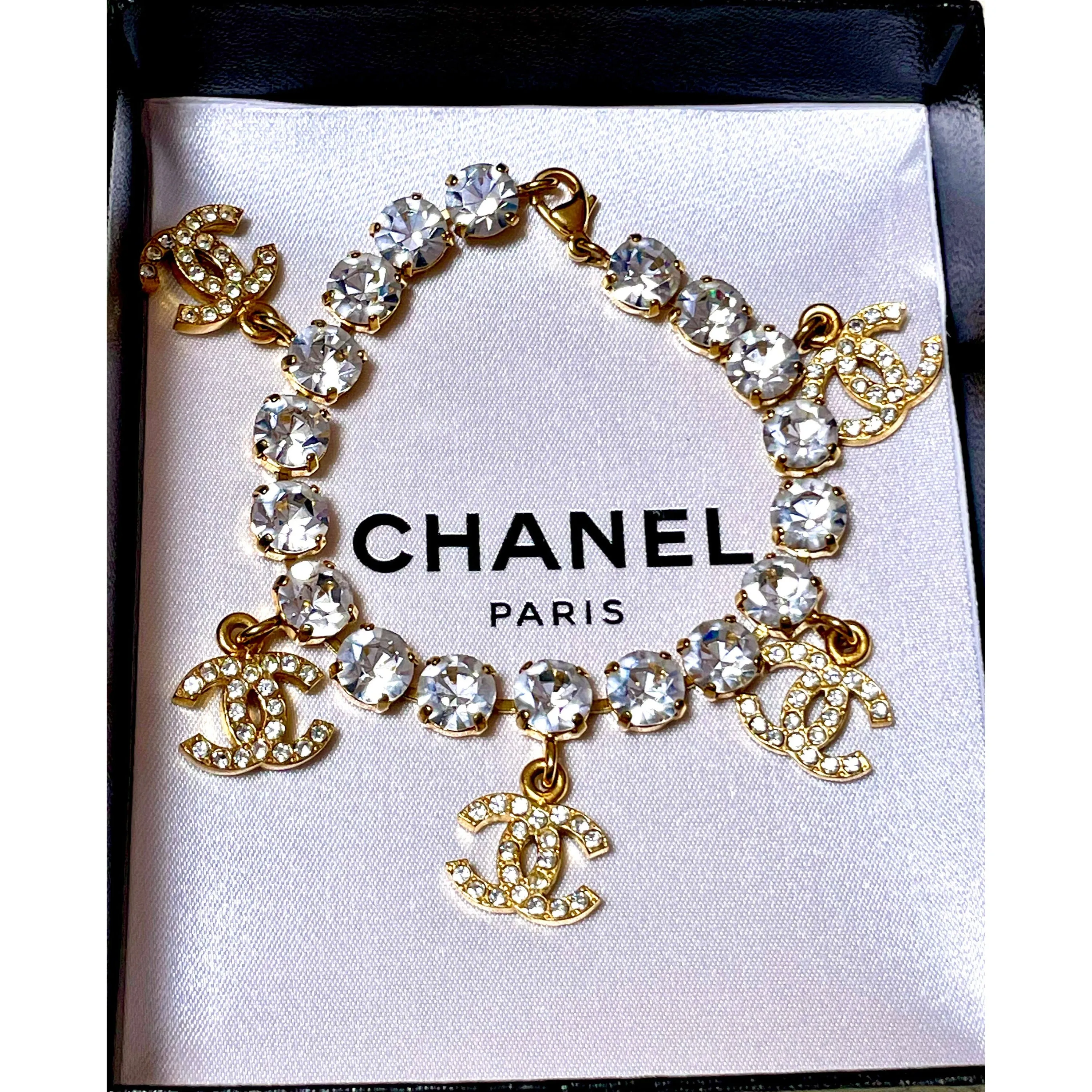Vintage Chanel bracelet with crystal and CC charms. Must have gorgeous jewelry piece. 0407131